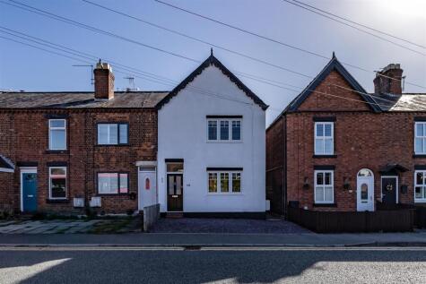 Perfectly presented end terraced property with period charm and generous rear garden