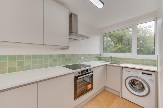 SITTING ROOM AND KITCHEN