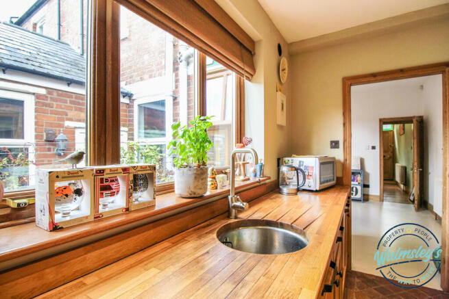 Kitchen with integrated appliances & butchers bloc