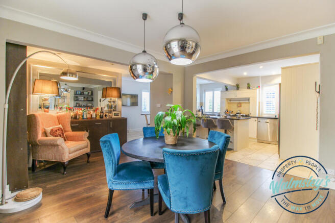 Family room with kitchen beyond
