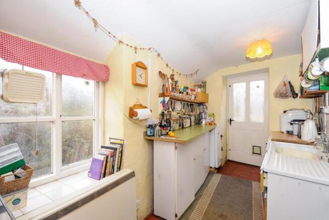 Kitchen overlooking the stream and fields