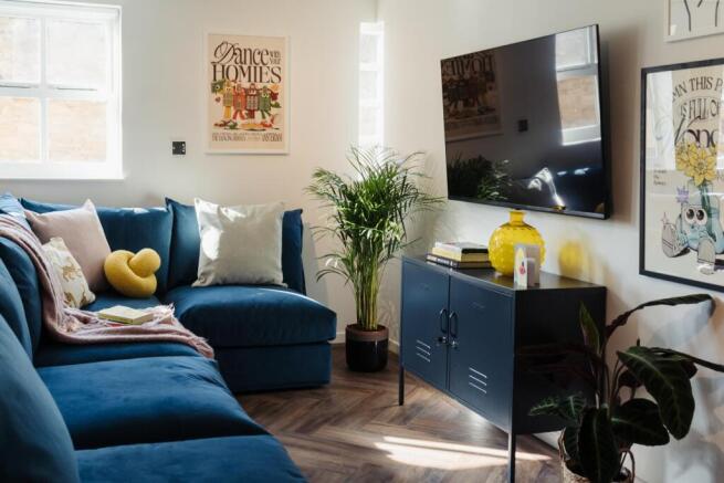 A modern and inviting living room featuring a l...