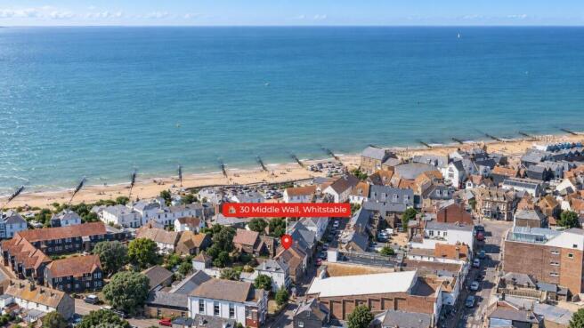 Aerial View of the Coastal Town and Beach_original