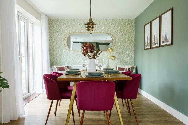 Double doors from the dining area lead to the garden, perfect for al fresco dining