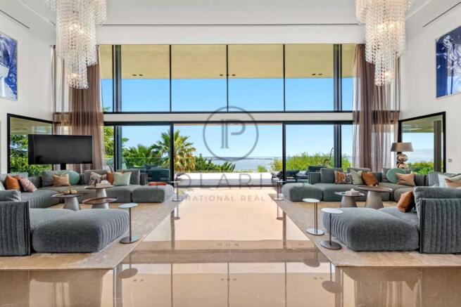 Luxurious modern living room with high ceilings, e