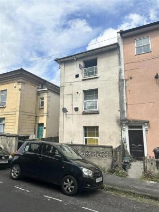Front exterior of a multi-storey townhouse...
