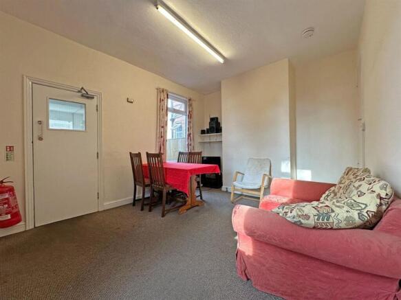 Bright living room with comfortable sofa and ta...