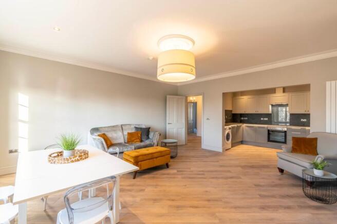 Spacious open-plan living with modern kitchen...