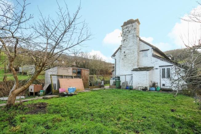 Mature gardens surriounding the house