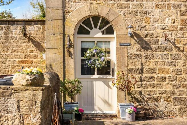 Stable Door & Arched Stone Detailing