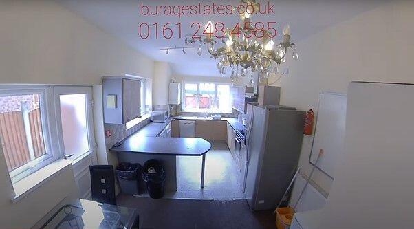 Bright, spacious kitchen with breakfast bar...