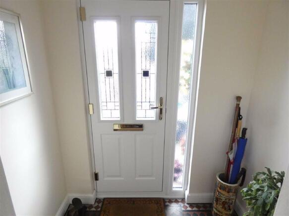 ENCLOSED STORM PORCH