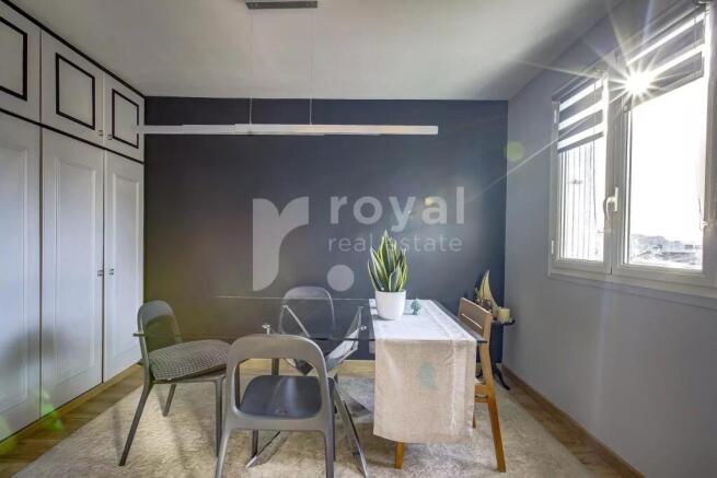 Elegant dining space in renovated apartment walkin