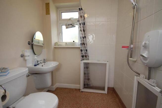 SHOWER ROOM/UTILITY ROOM