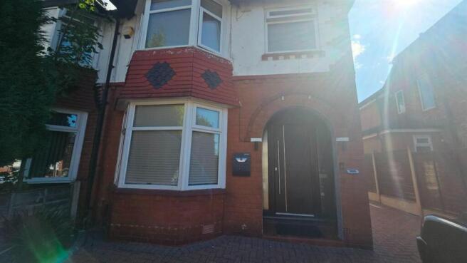 Charming exterior of a traditional brick home...