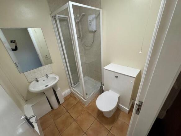 A clean and well-maintained bathroom featuring ...