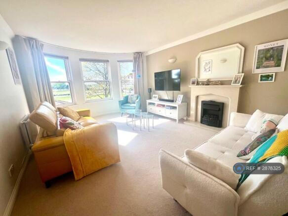 Spacious Living Room With Bay Window