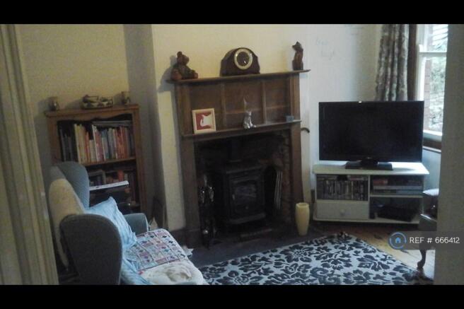 Rear Lounge And Wood Burning Stove