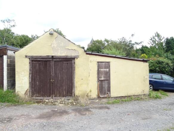 Adjacent Garage & Store
