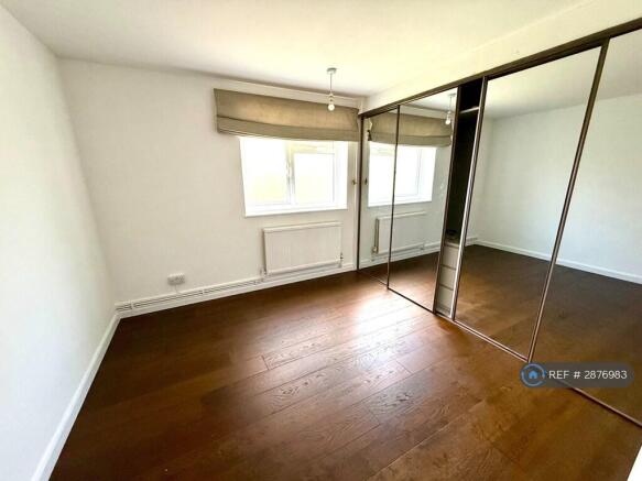Bedroom With Ample Storage 