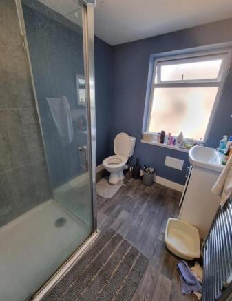 Modern bathroom with large walk-in shower...