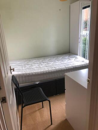 Bright single bedroom with a fresh mattress, bu...