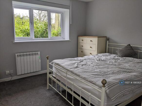 King-Size Bed - Bedding Not Included