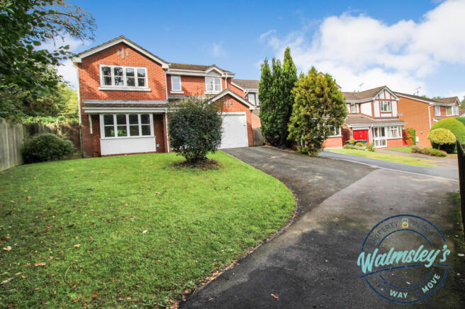 Substantial front with driveway