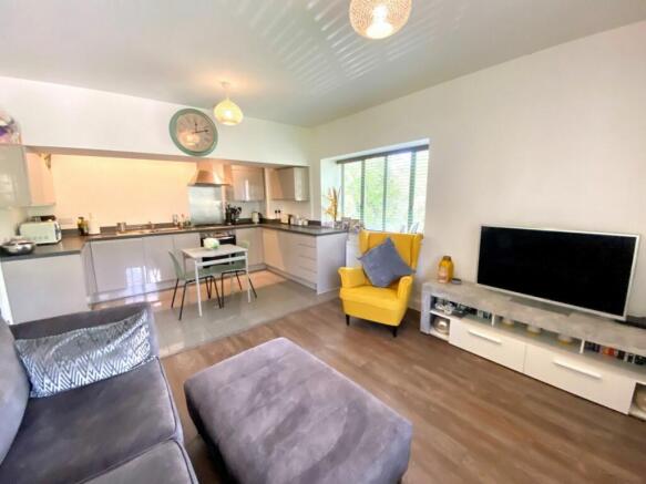 OPEN PLAN LIVING AREA AND KITCHEN AREA