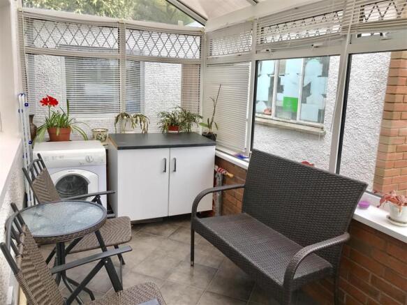 SUN ROOM/UTILITY