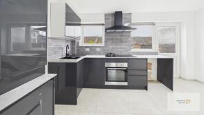 33, Wheatfield Close, Bury BL9 6XD