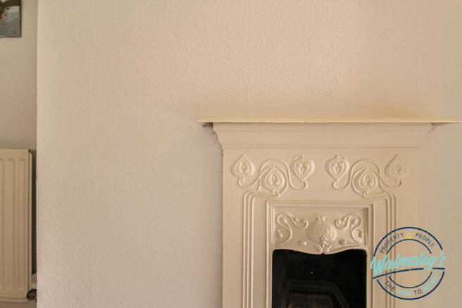 Bedroom three fireplace