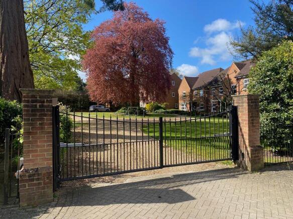ELECTRIC GATES TO THE PRIVATE GARDENS...