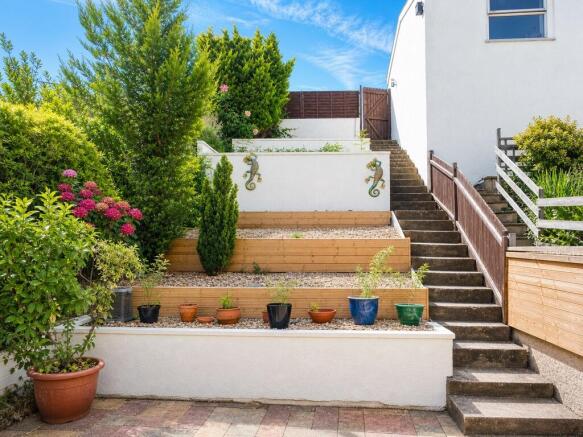 Beautifully terraced garden with vibrant plants...