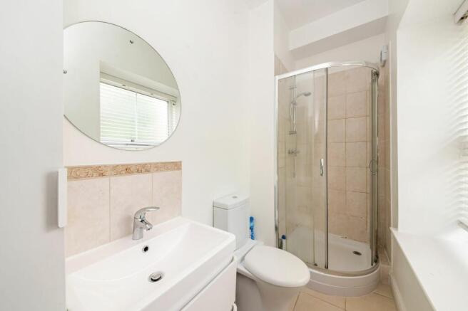 BEDROOM ONE EN-SUITE SHOWER ROOM