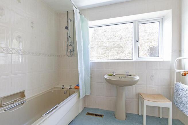 Fully Tiled Family Bathroom