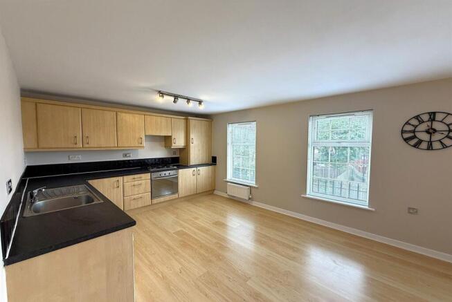Spacious open-plan kitchen with modern finishes...