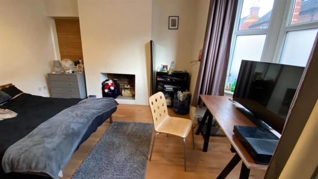 Bright spacious bedroom with study area and TV...