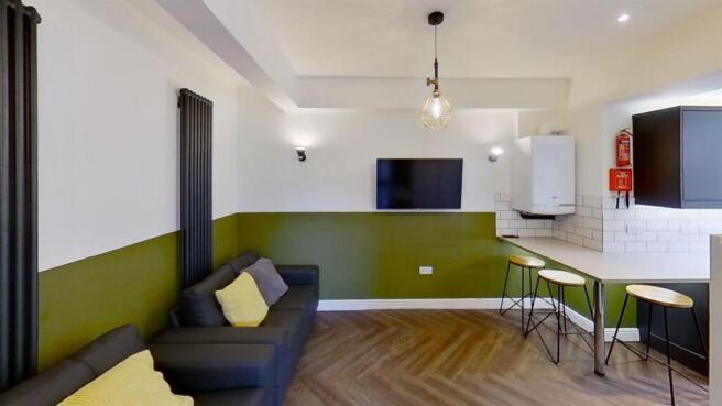 Stylish lounge with modern decor and parquet fl...