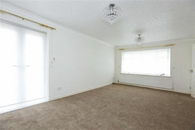 LIVING ROOM OPEN TO DINING AREA