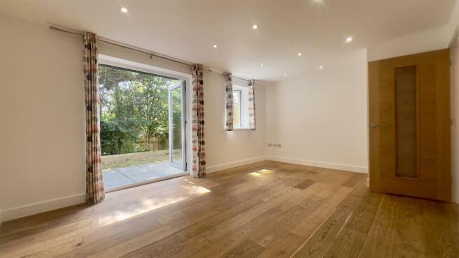 Lounge wit Patio Doors to Garden