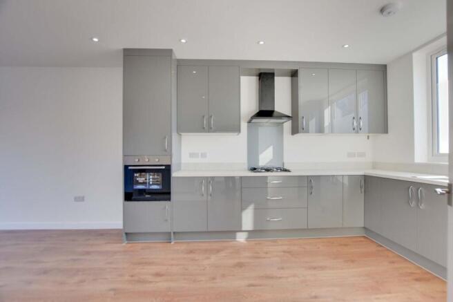 Open Plan L-Shaped Living / Kitchen / Dining Room