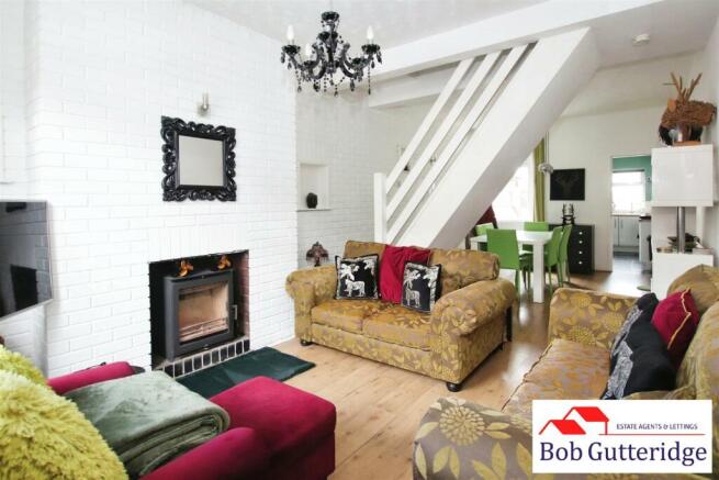 THROUGH LOUNGE/DINING ROOM
