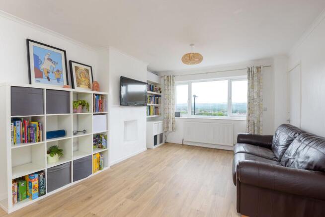 KITCHEN SITTING ROOM AND DINING ROOM