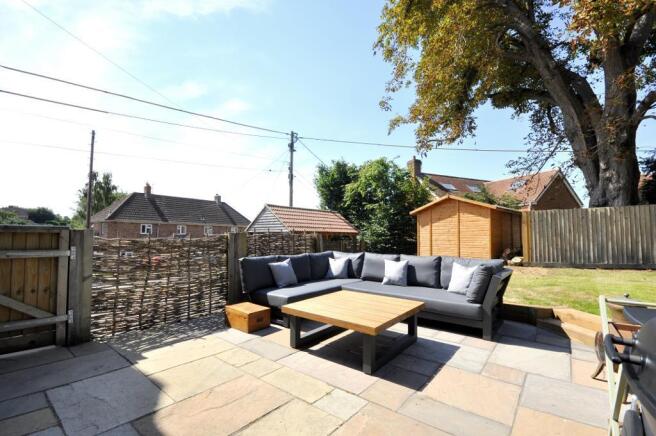 Recently extended Indian sandstone patio