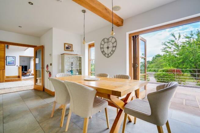 Kitchen/dining area with doors to patio