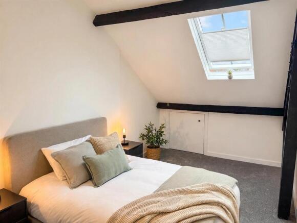 07_Flat52_Bedroom_Velux_Blind_Open_Cushions_Plants