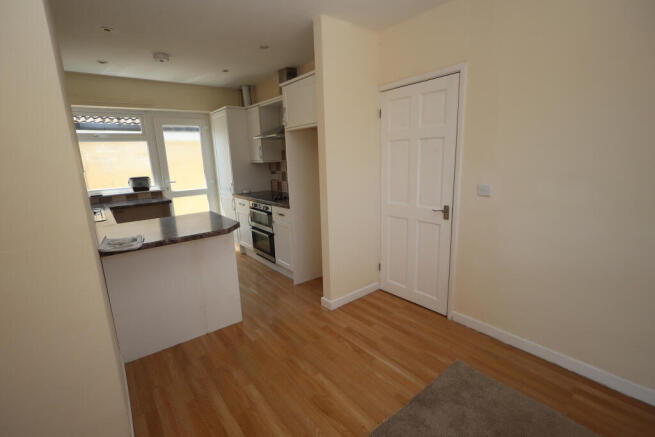 Dining area through to kitchen