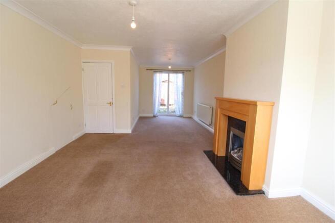 THROUGH LOUNGE/DINING AREA
