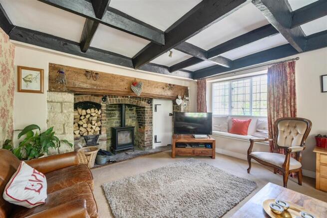 Living room/snug with fireplace and period feature